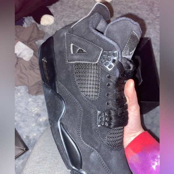 Retro 4 black cats never worn got them for 1,200 but I’m asking for $450.